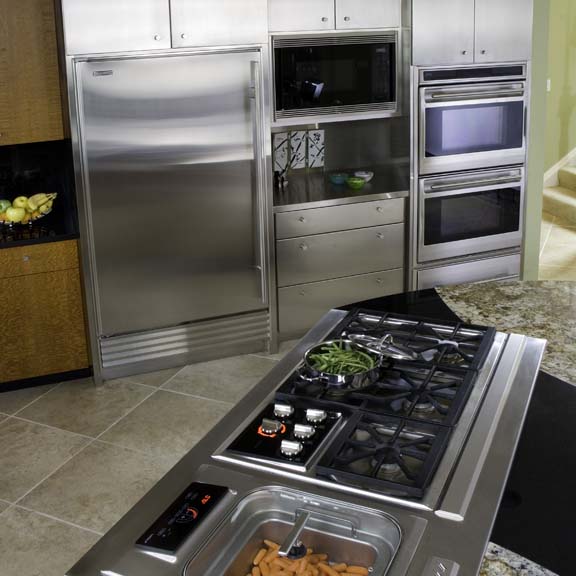 MetalCraft Custom Wall of Stainless Cabinets and Chef's Station